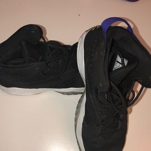 Black, white, and purple Jordan 8s